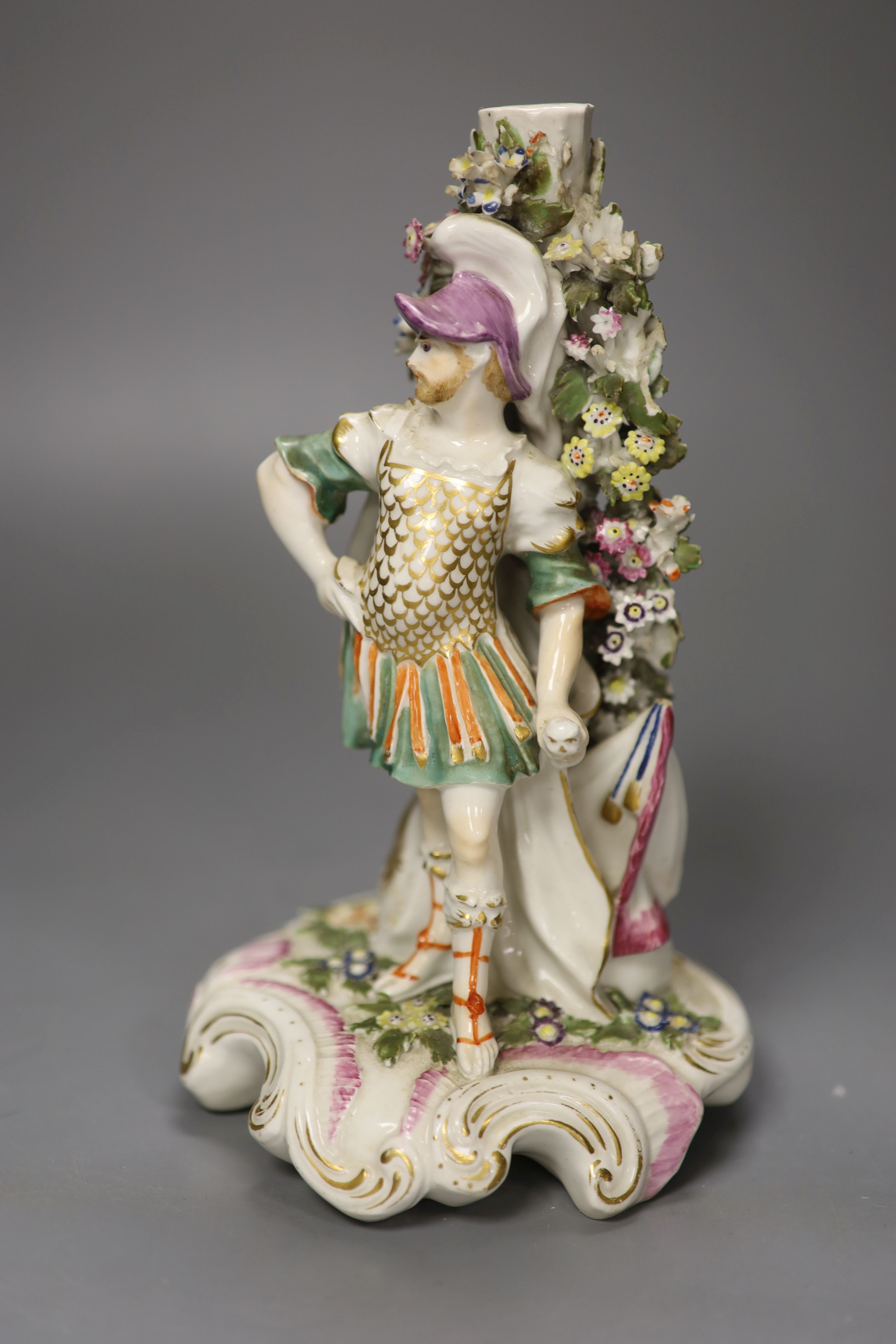 A Derby figure of Mars standing beside a shield in front of a flowering tree c. 1765-70, height 22cm
